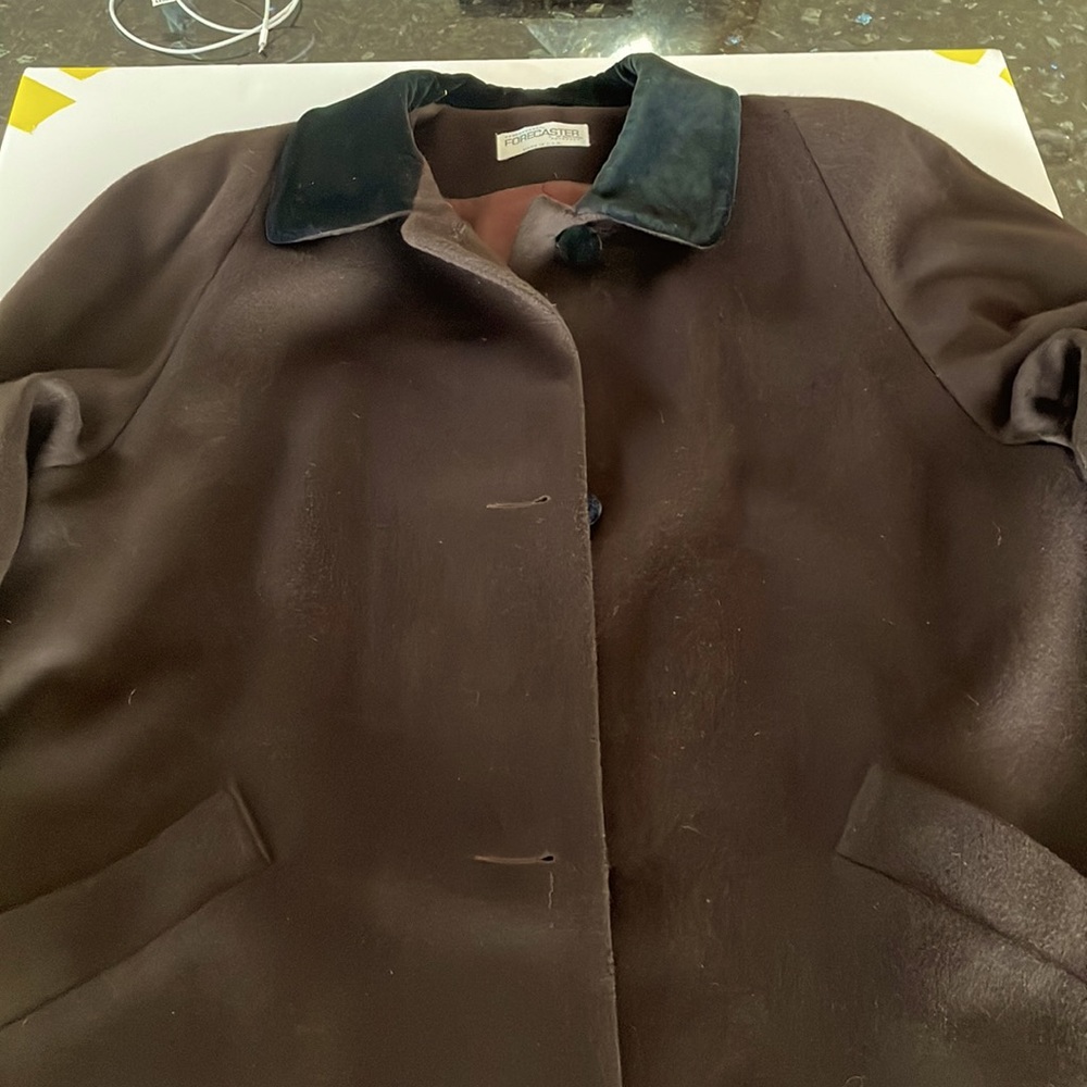 Woman’s size 16 wool dress coat. Brown with black  velour  collar. Lined inside.